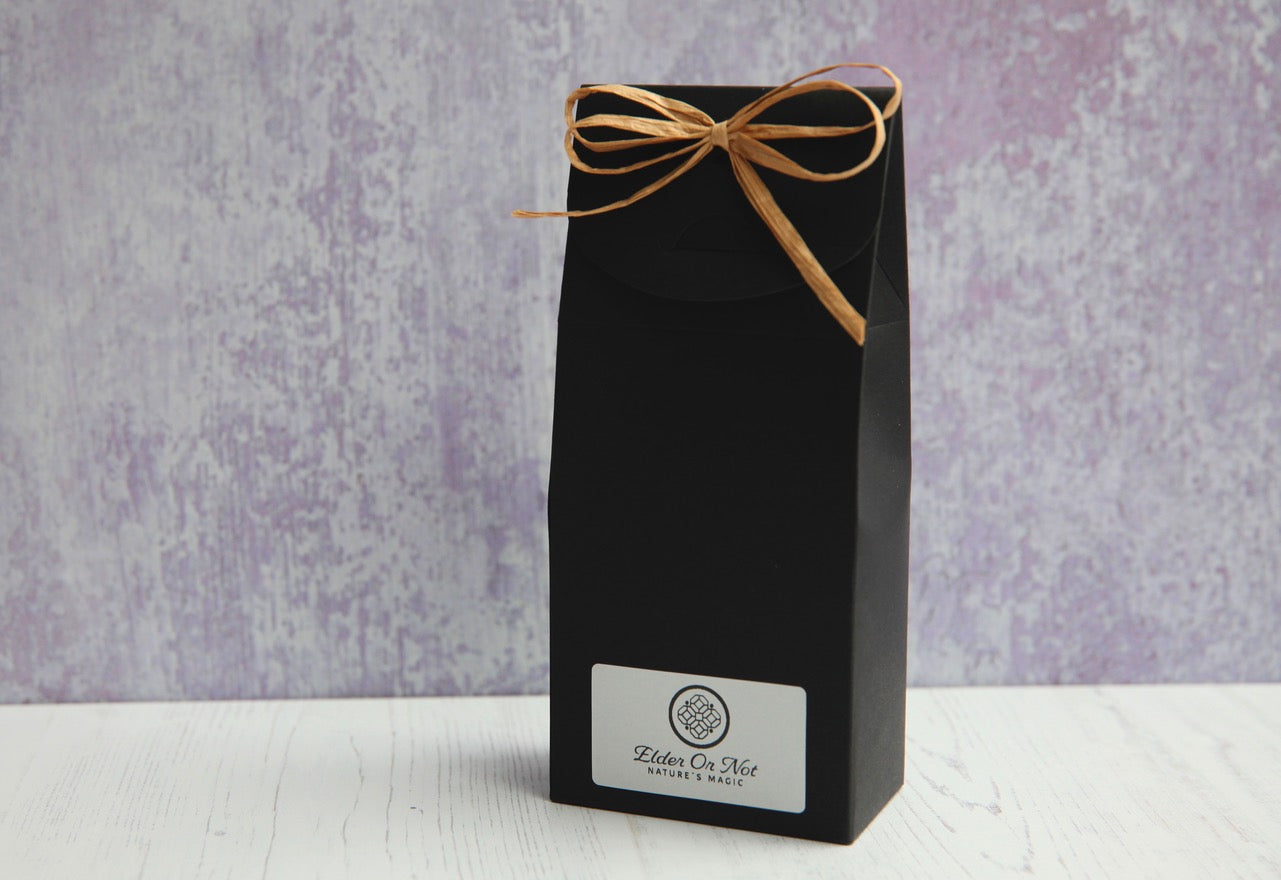 Gift wrap for one individual product black pinch top pouch box